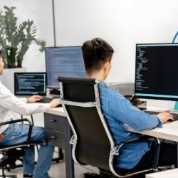 guys coding on computer